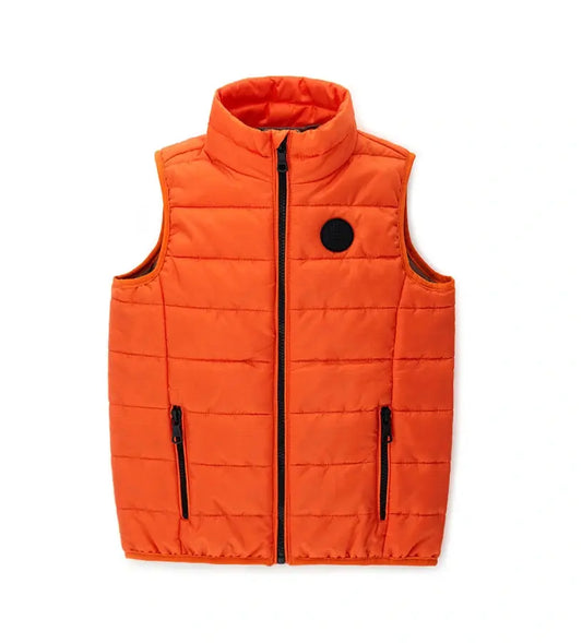 Παιδικό αμάνικο μπουφάν σε πορτοκαλί χρώμα με εσωτερική επένδυση σε αντίθεση.