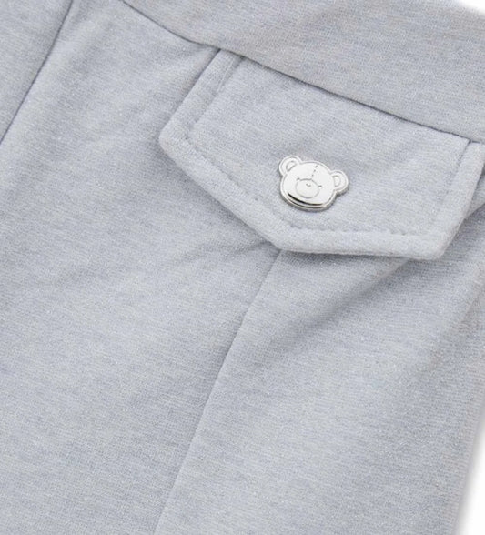 Φόρμα με νήματα lurex και ελαστική μέση για ιδανική άνεση. Οι ψεύτικες τσέπες στο μπροστινό μέρος προσθέτουν μια κομψή πινελιά, κάνοντας το ρούχο πρακτικό και λαμπερό.