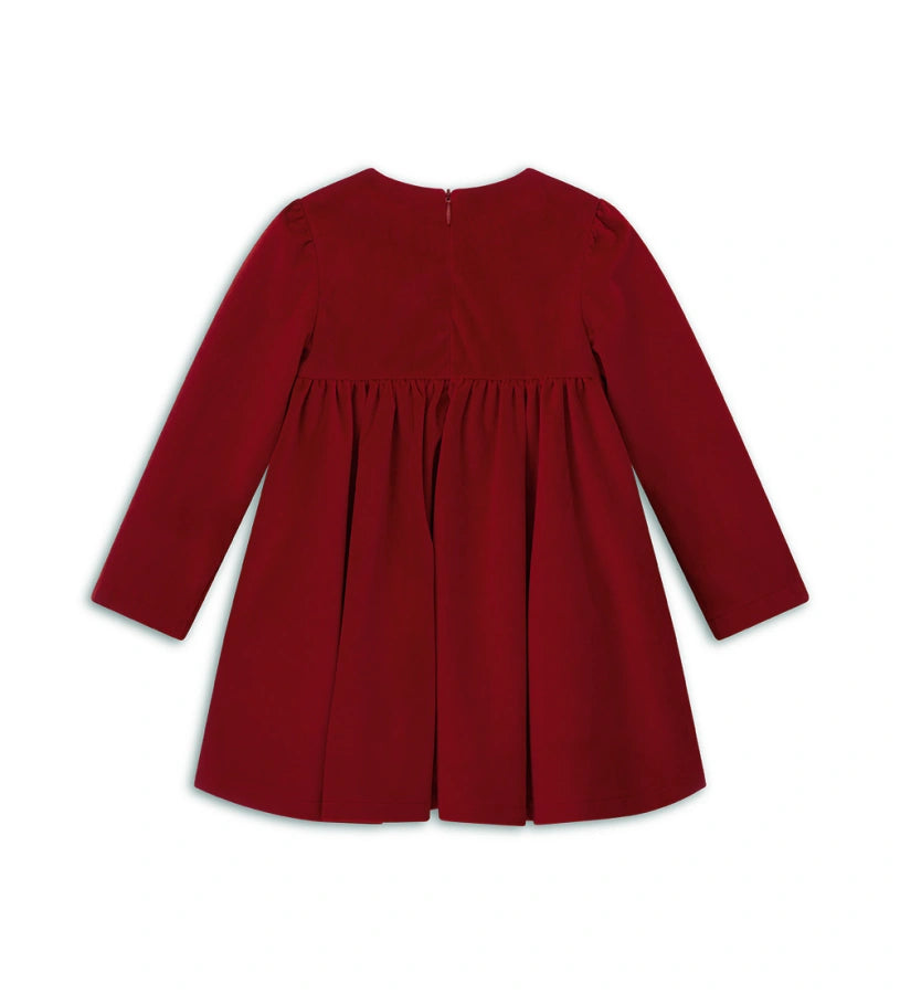 Βελούδινο φόρεμα με μακριά μανίκια και στρογγυλή λαιμόκοψη, με επένδυση από απαλό βαμβάκι. Διαθέτει άνοιγμα στο πίσω μέρος με κρυφό φερμουάρ και κέντημα στην πλευρά της καρδιάς.