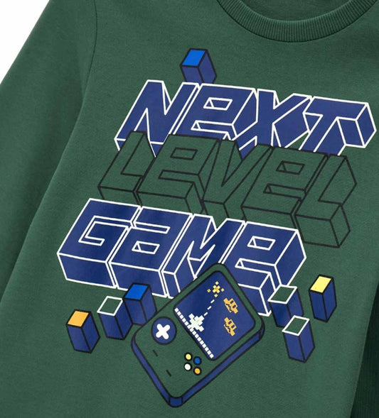 Ζεστή βαμβακερή πυτζάμα με μπλούζα στρογγυλή λαιμόκοψη και πολύχρωμο τύπωμα, με ριμπ τελειώματα. Παντελόνι με allover τύπωμα και ριμπ τελειώματα, για ένα άνετο και στιλάτο στυλ.