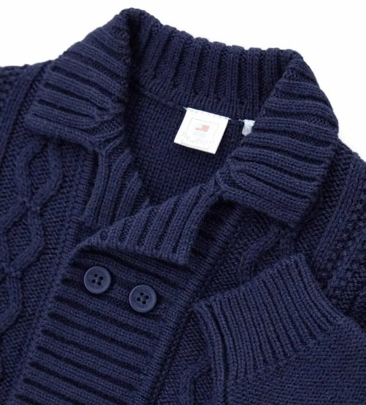 Ζακέτα από μάλλινο μείγμα με γιακά σάλι, ριμπ τελείωμα και κουμπιά μπροστά. Ένα ζεστό και κομψό ρούχο, ιδανικό για τις πιο στιλάτες εμφανίσεις.