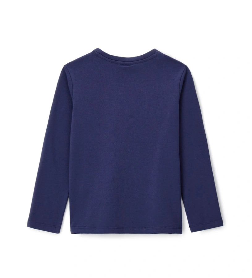 Παιδική μπλούζα Disney Stitch από ελαστικό βαμβάκι με μακριά μανίκια και στρογγυλή λαιμόκοψη. Διακοσμημένη με λαμπερό foil τύπωμα του Stitch και τρουκς, προσφέρει φωτεινό και μοντέρνο στυλ. Ιδανική για κοριτσίστικες εμφανίσεις με άνεση και λάμψη.