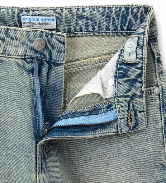 Λεπτομέρεια από το κούμπωμα με φερμουάρ και την εξατομικευμένη ετικέτα της Original Marines.