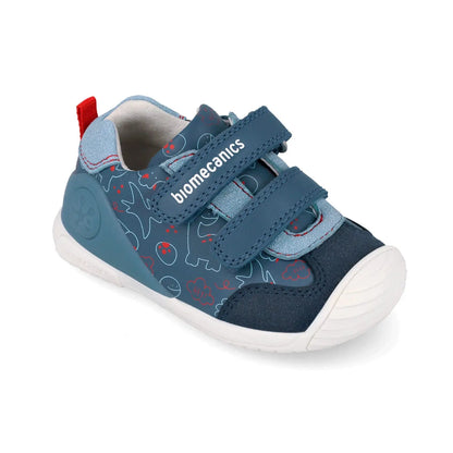 Βρεφικό sneaker Biomecanics για αγόρι σε μπλε χρώμα με παιχνιδιάρικα σχέδια και σκρατς.