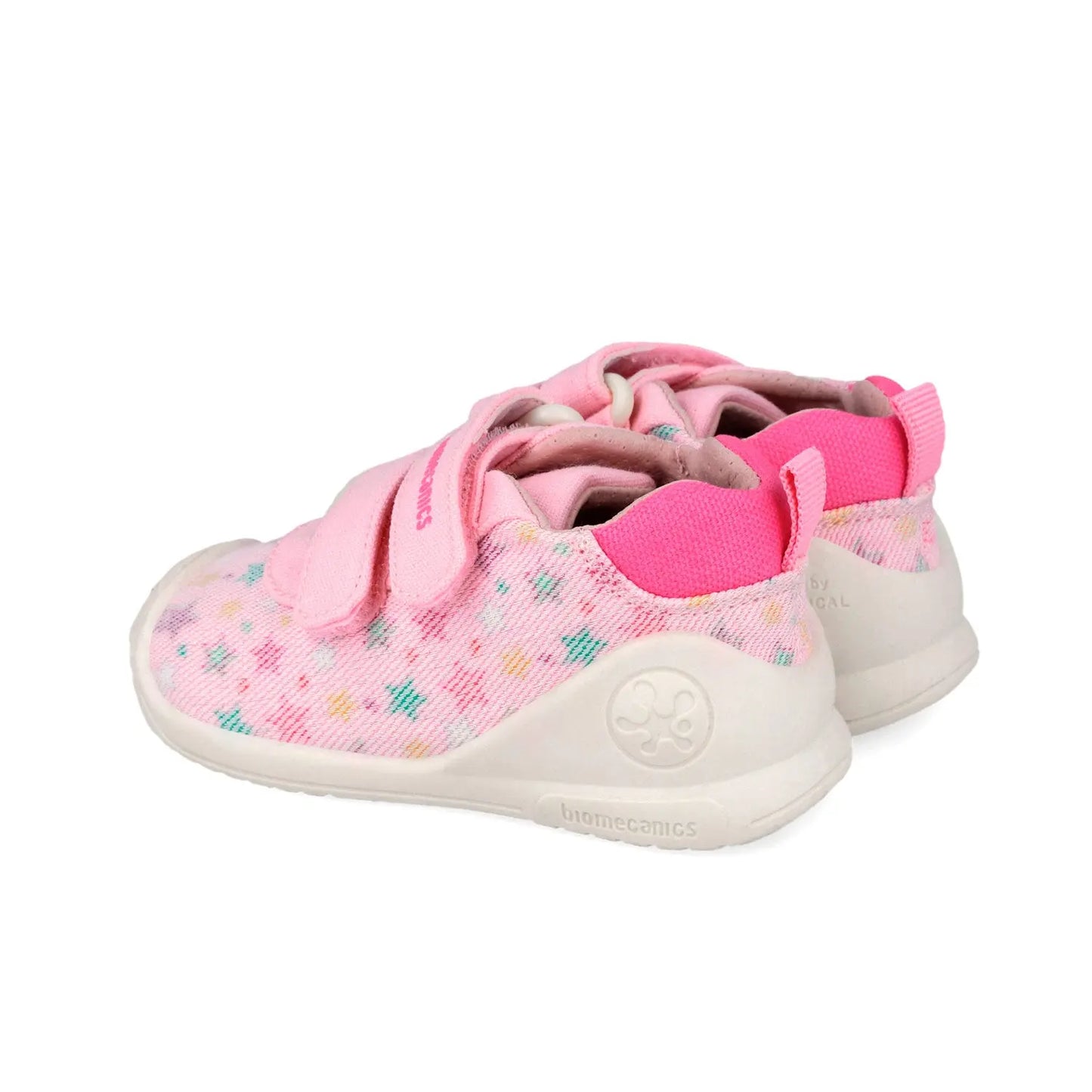 Βρεφικά sneakers Biomecanics για κορίτσι σε λευκό δέρμα με ροζ λεπτομέρειες και κλείσιμο velcro.