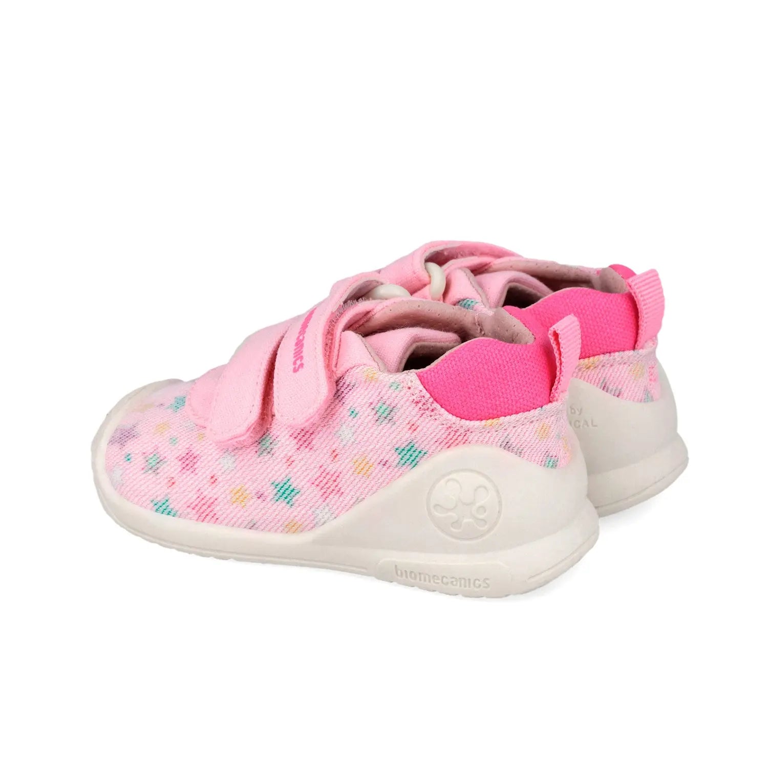 Βρεφικά sneakers Biomecanics για κορίτσι σε λευκό δέρμα με ροζ λεπτομέρειες και κλείσιμο velcro.