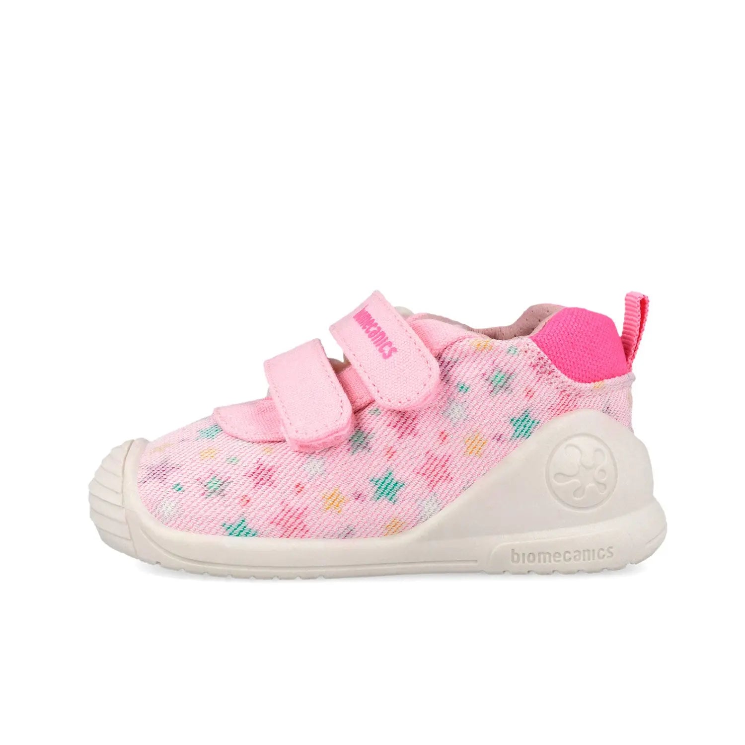 Βρεφικά sneakers Biomecanics για κορίτσι σε λευκό δέρμα με ροζ λεπτομέρειες και κλείσιμο velcro.