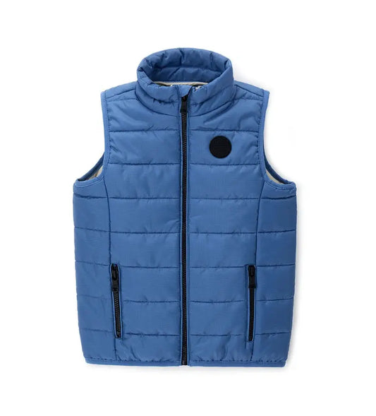 Παιδικό αμάνικο μπουφάν σε μπλε χρώμα με εσωτερική επένδυση σε αντίθεση.
