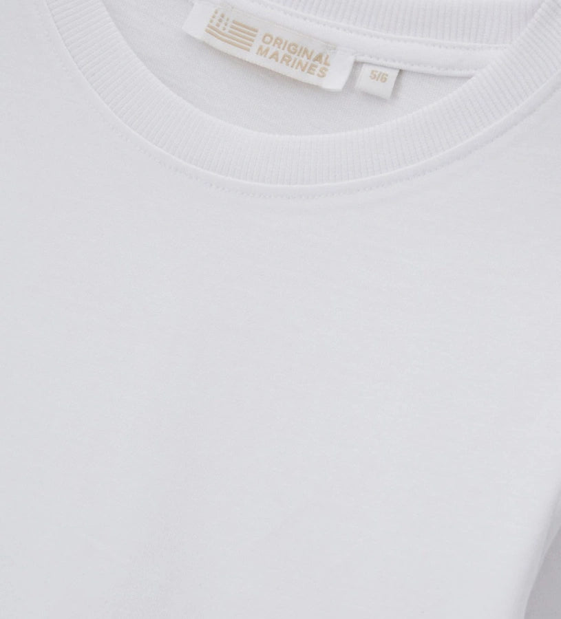 Μπλούζα με μακριά μανίκια από απαλό βαμβακερό ζέρσεϊ, ιδανική για καθημερινή άνεση. Η στρογγυλή λαιμόκοψη με ριμπ ύφανση προσθέτει στυλ και πρακτικότητα στην εμφάνιση.