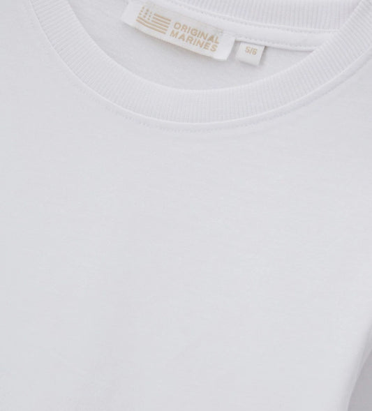 Μπλούζα με μακριά μανίκια από απαλό βαμβακερό ζέρσεϊ, ιδανική για καθημερινή άνεση. Η στρογγυλή λαιμόκοψη με ριμπ ύφανση προσθέτει στυλ και πρακτικότητα στην εμφάνιση.