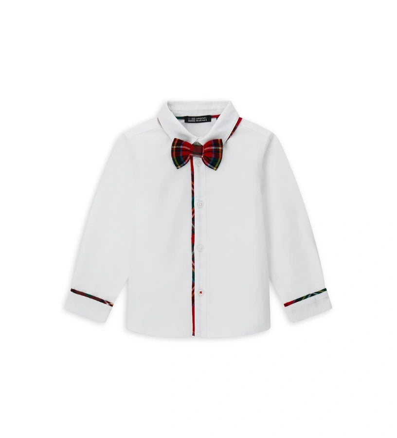 Βαμβακερό πουκάμισο με μακριά μανίκια και μπροστινό άνοιγμα με κουμπιά. Διαθέτει ρέλι και αποσπώμενο παπιγιόν από φανέλα για μια κομψή πινελιά, καθώς και κεντημένη ετικέτα στο πλάι.