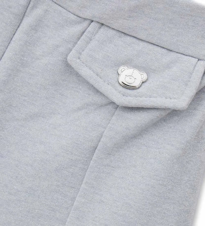 Φόρμα με νήματα lurex και ελαστική μέση για ιδανική άνεση. Οι ψεύτικες τσέπες στο μπροστινό μέρος προσθέτουν μια κομψή πινελιά, κάνοντας το ρούχο πρακτικό και λαμπερό.