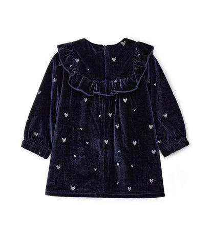 Φόρεμα από βελούδινο chenille με στρογγυλή λαιμόκοψη, διακοσμητική λεπτομέρεια με βολάν στο μπροστινό μέρος, μανίκια με σούρα στο τελείωμα και συνολικό τύπωμα με γκλίτερ.