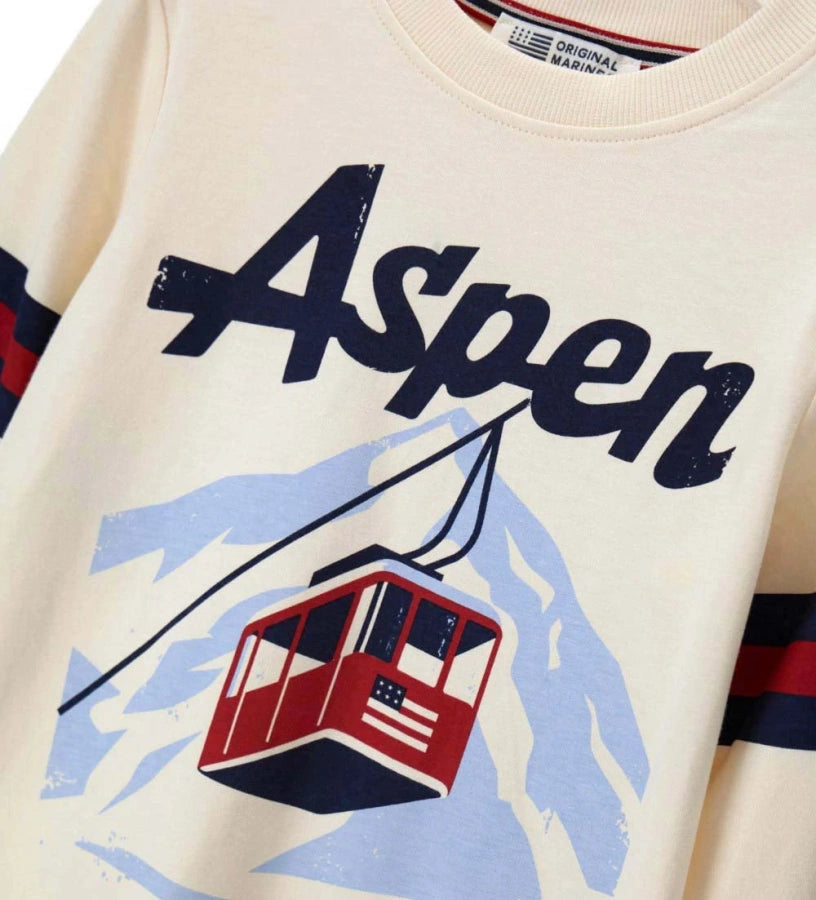 Μπλουζάκι μακρυμάνικο σε εκρού χρώμα, από απαλό βαμβάκι, με στρογγυλή λαιμόκοψη και ριμπ τελείωμα. Διακοσμημένο με στάμπες, ιδανικό για άνετες και μοντέρνες εμφανίσεις.