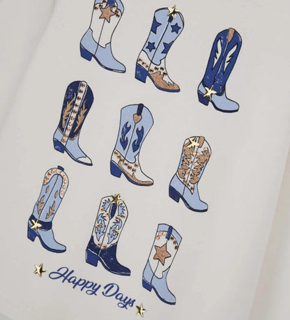 Μπλούζα από ελαστικό βαμβάκι με μακριά μανίκια και στρογγυλή λαιμόκοψη. Το μπροστινό τύπωμα είναι διακοσμημένο με γκλίτερ λεπτομέρειες και τρουκς, προσφέροντας λαμπερό και μοντέρνο στυλ. Ιδανική για κοριτσίστικες εμφανίσεις με άνεση και λάμψη.