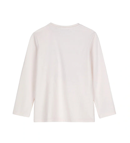 Μπλούζα από ελαστικό βαμβάκι με στρογγυλή λαιμόκοψη και μακριά μανίκια. Το τύπωμα και οι λεπτομέρειες με στρας προσθέτουν μια λαμπερή και μοντέρνα πινελιά.