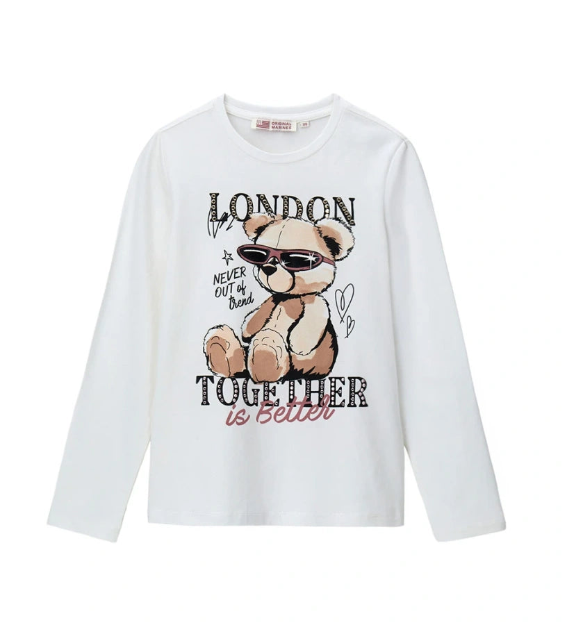 Μπλούζα με στρογγυλή λαιμόκοψη και μακριά μανίκια, από απαλό ύφασμα jersey, με τύπωμα και απλικέ στο μπροστινό μέρος. Ιδανική για casual αλλά πάντα μοντέρνες παιδικές εμφανίσεις, συνδυάζοντας άνεση και στυλ.