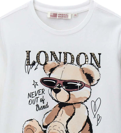 Μπλούζα με στρογγυλή λαιμόκοψη και μακριά μανίκια, από απαλό ύφασμα jersey, με τύπωμα και απλικέ στο μπροστινό μέρος. Ιδανική για casual αλλά πάντα μοντέρνες παιδικές εμφανίσεις, συνδυάζοντας άνεση και στυλ.