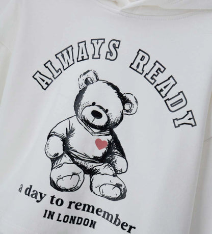 Βαμβακερή μπλούζα με κουκούλα και τύπωμα. Τα ριμπ τελειώματα προσθέτουν στυλ και άνεση για μια μοντέρνα εμφάνιση.