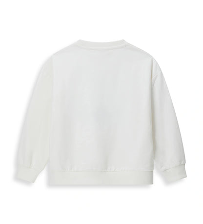 Φούτερ από ελαστικό βαμβάκι με στρογγυλή λαιμόκοψη και μακριά μανίκια. Διαθέτει ζεστή και απαλή φλις επένδυση εσωτερικά, καθώς και τύπωμα με γκλίτερ και παγιέτες στο μπροστινό μέρος για μια λαμπερή εμφάνιση.