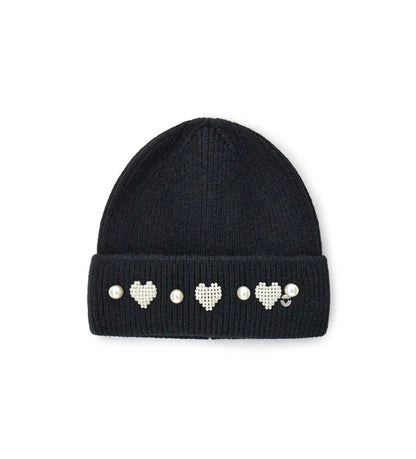 Πλεκτό σκουφάκι με διακοσμημένο ρεβέρ, ιδανικό για να προσθέσει μια πινελιά στυλ στις χειμερινές εμφανίσεις. Ζεστό, άνετο και ευέλικτο, προσφέρει προστασία από το κρύο με μοντέρνο και κομψό χαρακτήρα.