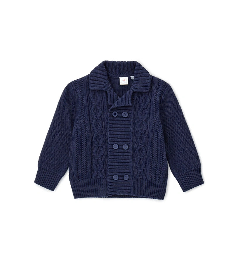 Ζακέτα από μάλλινο μείγμα με γιακά σάλι, ριμπ τελείωμα και κουμπιά μπροστά. Ένα ζεστό και κομψό ρούχο, ιδανικό για τις πιο στιλάτες εμφανίσεις.