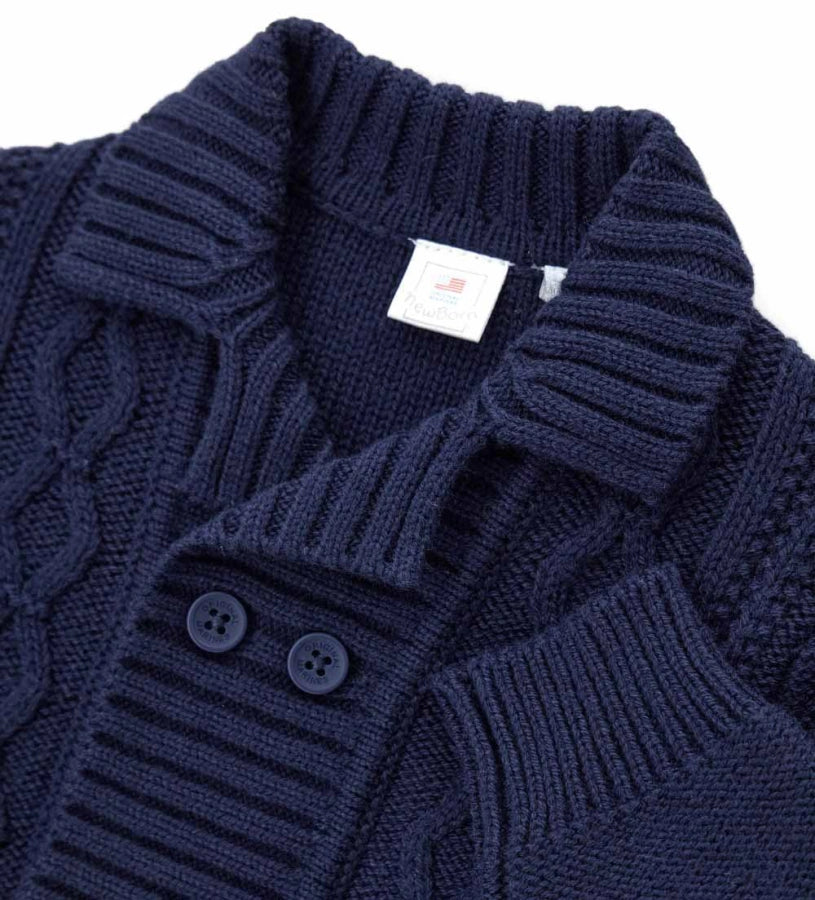 Ζακέτα από μάλλινο μείγμα με γιακά σάλι, ριμπ τελείωμα και κουμπιά μπροστά. Ένα ζεστό και κομψό ρούχο, ιδανικό για τις πιο στιλάτες εμφανίσεις.