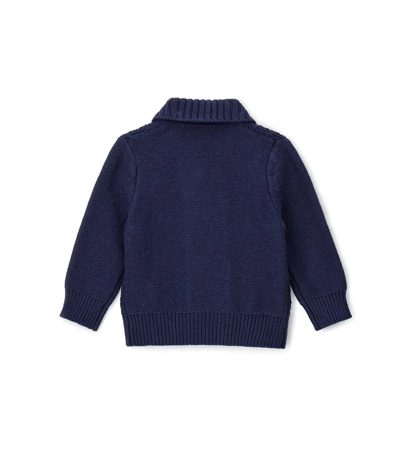 Ζακέτα από μάλλινο μείγμα με γιακά σάλι, ριμπ τελείωμα και κουμπιά μπροστά. Ένα ζεστό και κομψό ρούχο, ιδανικό για τις πιο στιλάτες εμφανίσεις.