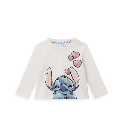 Μπλούζα Disney Stitch από ελαστικό βαμβάκι με στρογγυλή λαιμόκοψη, μακριά μανίκια και τύπωμα διακοσμημένο με στρας στο μπροστινό μέρος. Άνετη και λαμπερή.