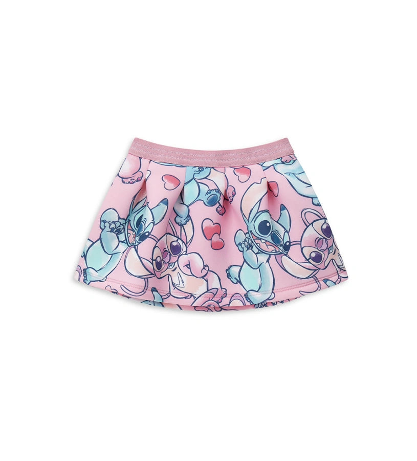 Φούστα από νεοπρένιο με σχέδιο Disney Stitch και άνετη ελαστική μέση από λούρεξ ζακάρ. Τολμηρή και φωτεινή, ιδανική για ζωηρά και διασκεδαστικά looks.