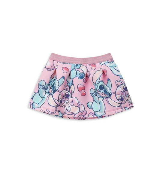 Φούστα από νεοπρένιο με σχέδιο Disney Stitch και άνετη ελαστική μέση από λούρεξ ζακάρ. Τολμηρή και φωτεινή, ιδανική για ζωηρά και διασκεδαστικά looks.
