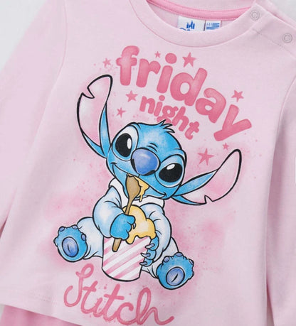 Πυτζάμα Disney Stitch από ζεστό βαμβάκι, με μπλούζα με στρογγυλή λαιμόκοψη, τύπωμα μπροστά, άνοιγμα στον ώμο και ριμπ τελειώματα, και παντελόνι σετ με φιόγκο.