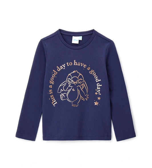 Παιδική μπλούζα Disney Stitch από ελαστικό βαμβάκι με μακριά μανίκια και στρογγυλή λαιμόκοψη. Διακοσμημένη με λαμπερό foil τύπωμα του Stitch και τρουκς, προσφέρει φωτεινό και μοντέρνο στυλ. Ιδανική για κοριτσίστικες εμφανίσεις με άνεση και λάμψη.