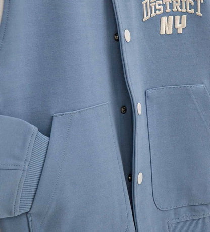Γαλάζιο παιδικό bomber jacket Original Marines με λευκές λεπτομέρειες και τύπωμα "DENIM DISTRICT NY" στο στήθος, για αγόρια 5-14 ετών.