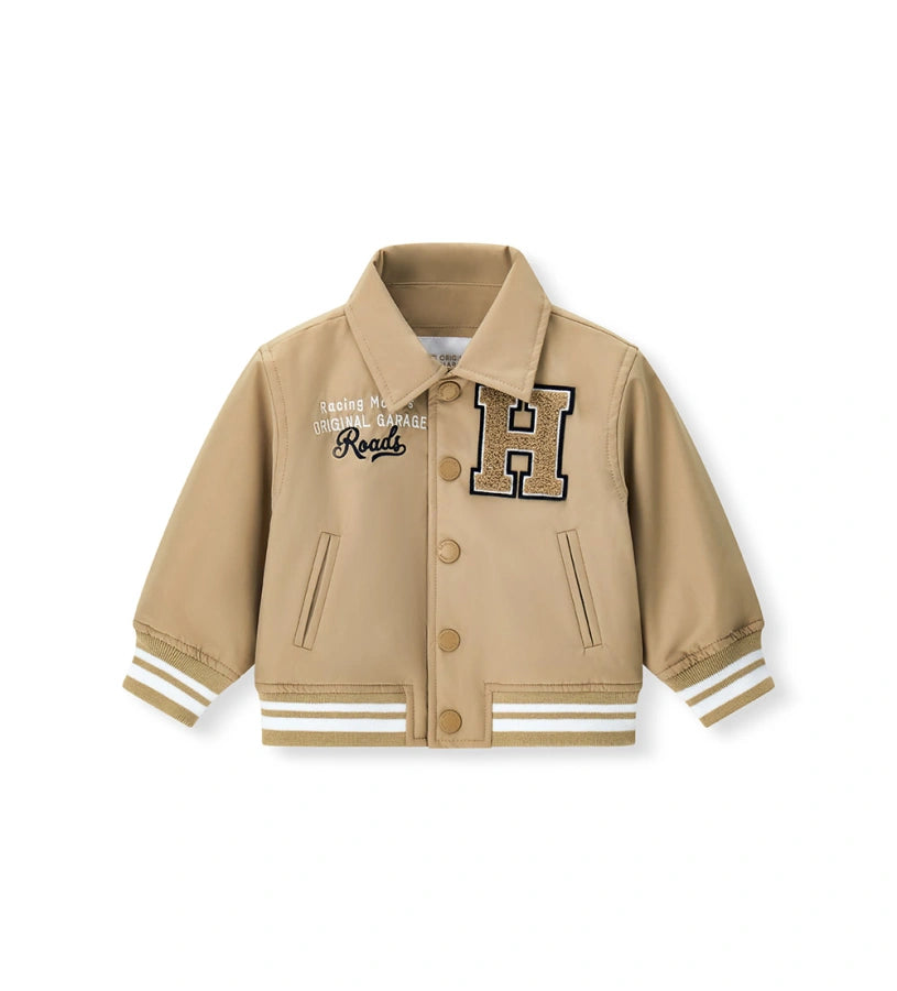 Παιδικό μπουφάν bomber για αγόρι με επένδυση, γιακά πουκάμισου και patches.