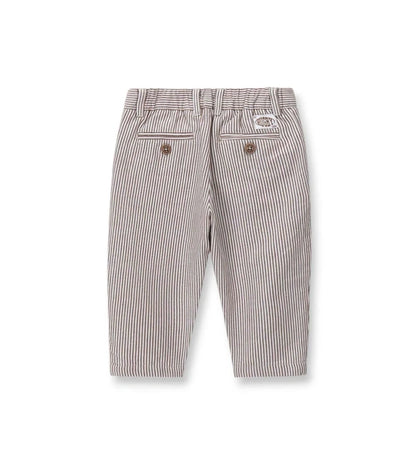 Η κομψή εφαρμογή και η δροσερή υφή του παιδικού ριγέ παντελονιού για ηλικίες 6m-5y.