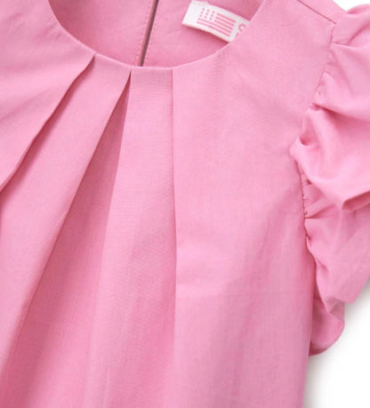 Το δροσερό ύφασμα ποπλίνας στην κοριτσίστικη αμάνικη μπλούζα για ηλικίες 6m-5y.