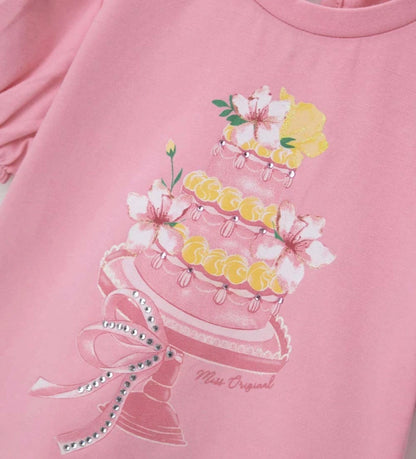 Το ελαστικό βαμβακερό μπλουζάκι για κορίτσια 6 μηνών έως 5 ετών σε απαλό ροζ χρώμα.