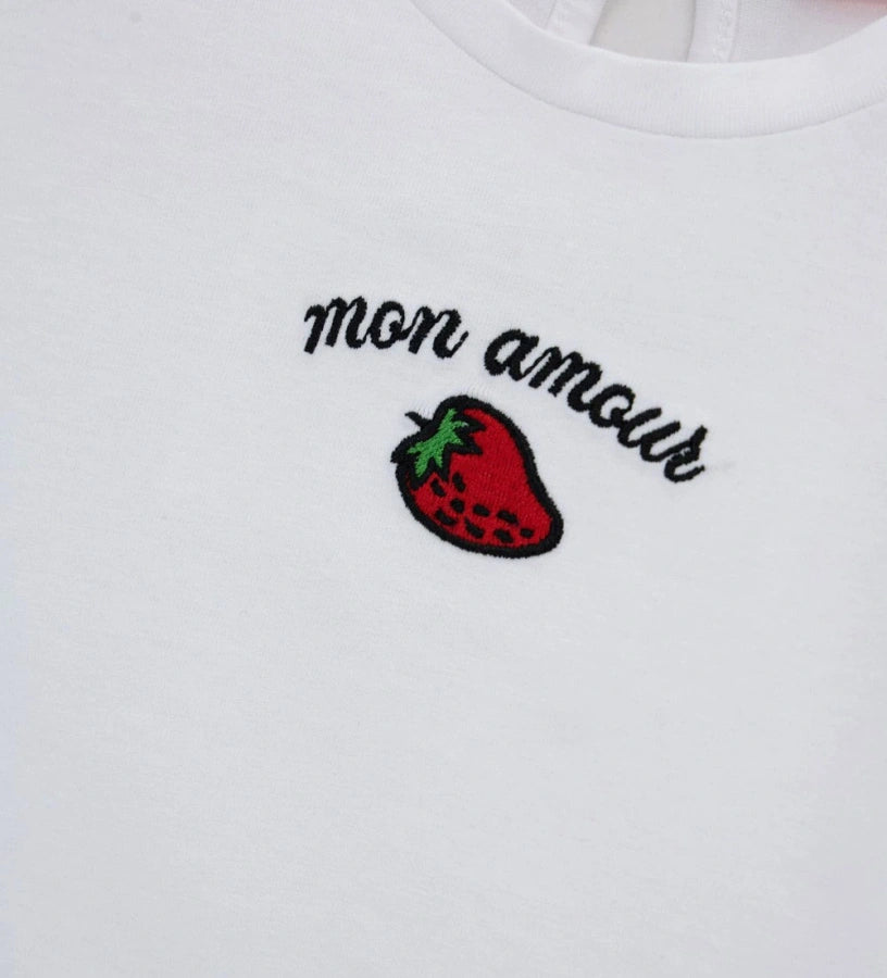 Μπροστινή όψη του λευκού κοριτσίστικου T-shirt από ελαστικό jersey για ηλικίες 6 μηνών έως 5 ετών.