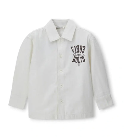 Παιδικό πουκάμισο για αγόρι από βαμβακερή γκαμπαρντίνα σε λευκή απόχρωση.