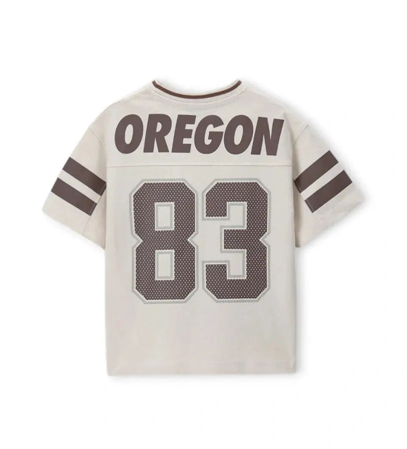 Η πίσω όψη του βαμβακερού T-shirt σε Μπεζ Απόχρωση Original Marines με το μεγάλο τύπωμα.