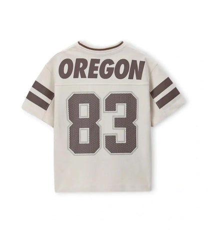 Η πίσω όψη του βαμβακερού T-shirt σε Μπεζ Απόχρωση Original Marines με το μεγάλο τύπωμα.