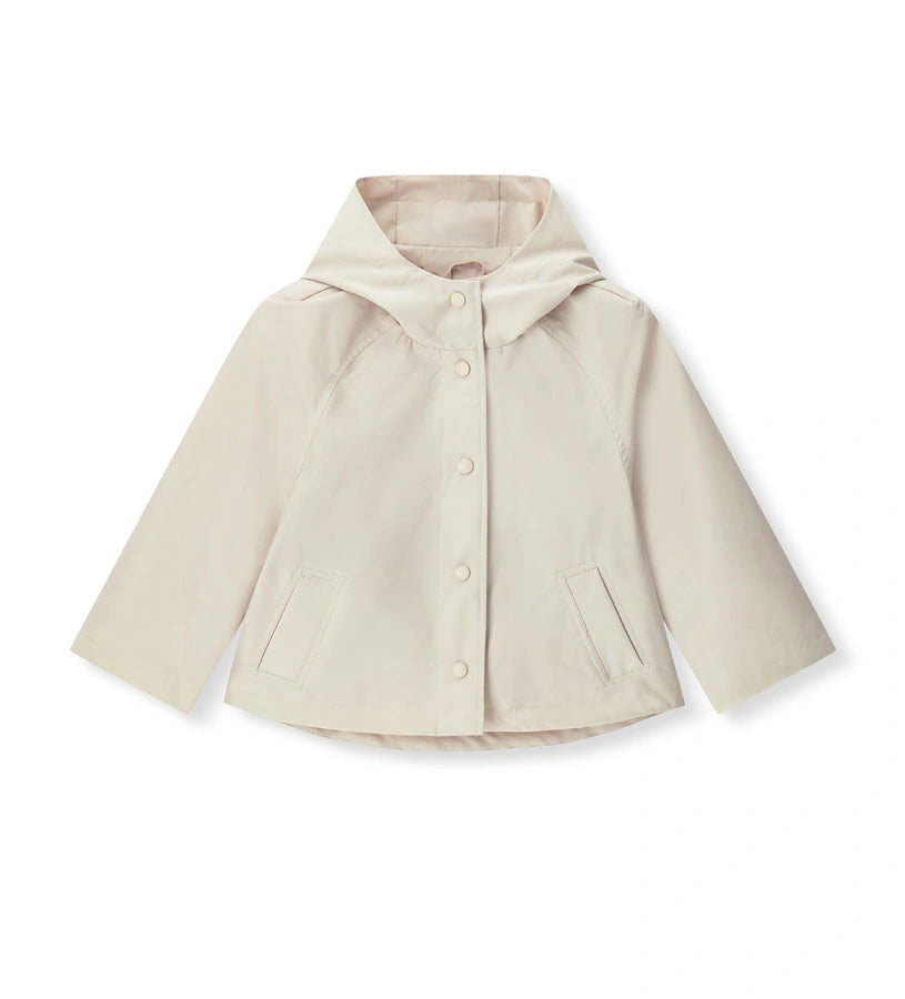 Παιδικό μπουφάν για κορίτσι σε μπεζ χρώμα με κουκούλα και κουμπιά.