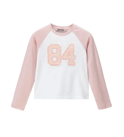 Παιδική μπλούζα για κορίτσι λευκή με raglan μανίκια και δαντέλα.
