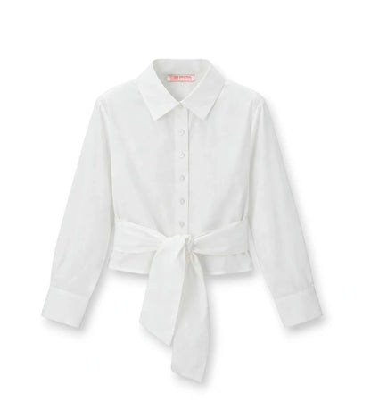 Παιδικό πουκάμισο για κορίτσι σε λευκό χρώμα με γιακά πέτο και αφαιρούμενη ζώνη στη μέση.