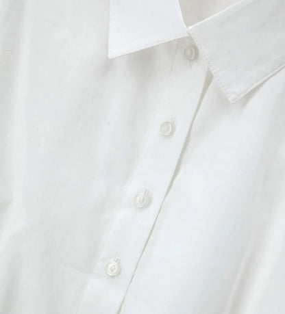 Λεπτομέρεια από τη ζώνη και το βαμβακερό ύφασμα στο κοριτσίστικο πουκάμισο Original Marines.