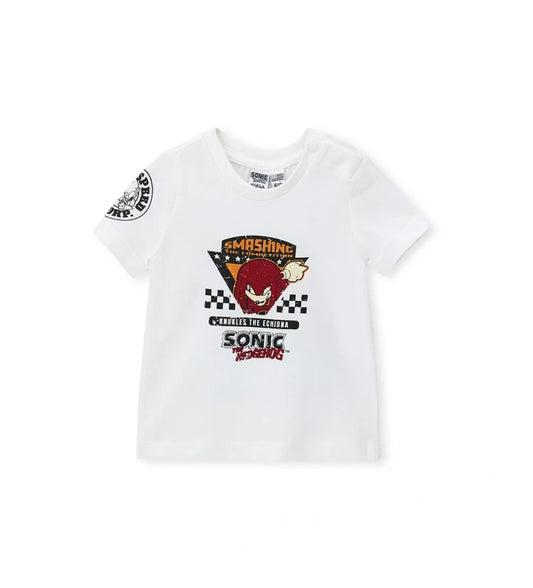 Μπροστινή όψη του παιδικού T-shirt Sonic σε cream χρώμα με λογότυπα και κουμπιά στον ώμο για ηλικίες 6 μηνών-5 ετών.