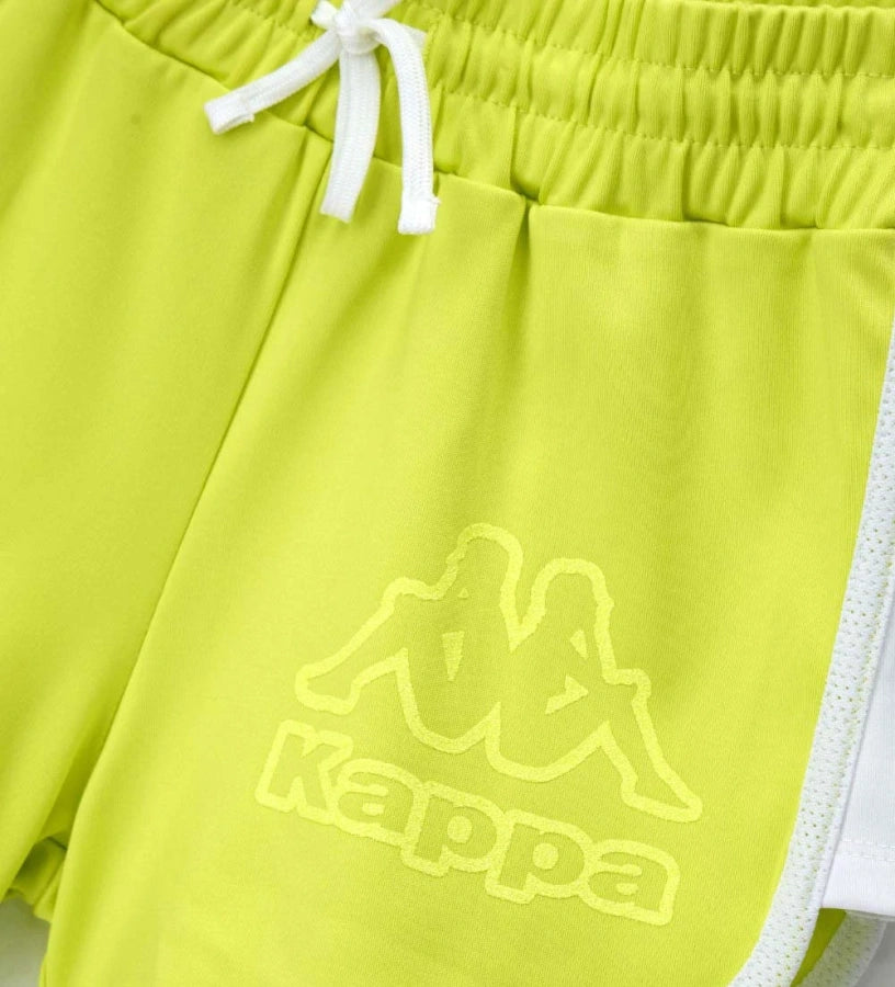 Παιδικό αθλητικό σορτς Kappa για κορίτσι σε κίτρινο χρώμα με λεπτομέρειες και glitter logo.